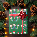 Grönten Gymnast i Cute Jul Gymnastics Girls Presentpapper<br><div class="desc">Denna vackra julomslutning i gymnastik pappra har tre söta gymnastikflickor som bär julhattar och som håller en attitydförläggning med rosett band på en helgdag i söt grönt. Blindingen håller ett rött band,  brunetten hoppar på en trampolin och den afrikanska amerikanska flickan håller ett grönt band.</div>