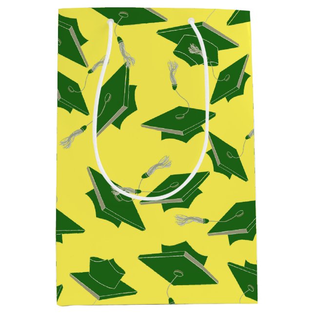 Gröntens Studentmössor i Luft på Gult (Framsidan)