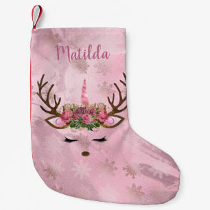 Grottenmajsrenar i ro snöflingor liten julstrumpa