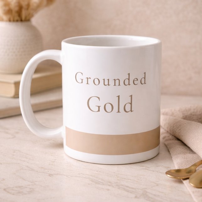 Grounded Gold Calm Classic Mugg, 330 ml Kaffemugg (White ceramic with a taupe base and soft gold serif text, designed for calm morning routines.)