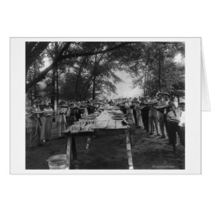 Group Eating Large Delar of Watermelon Hälsningskort