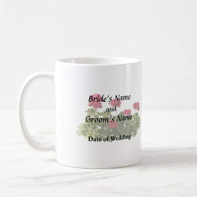 Grupp av röda geranier kaffemugg (Vänster)