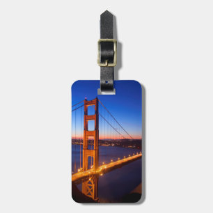 Gryning över San Francisco och den guld- grindbron Bagagebricka