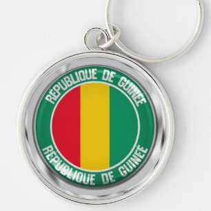 Guinea Round Emblem Rund Silverfärgad Nyckelring