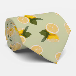 Gul citrus citronfrukt på blek limefruktgrönt slips