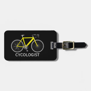 Gul cykel på svart bagagebricka