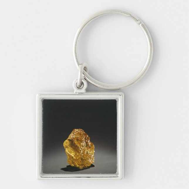 Gul diamant i busen fyrkantig silverfärgad nyckelring (Framsidan)