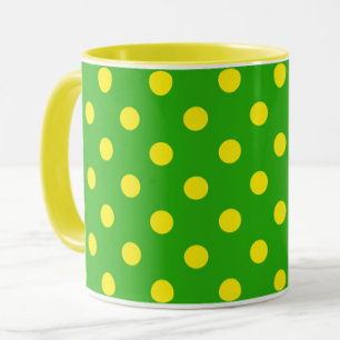Gul på grön prickmönsterdesign mugg