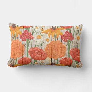 Gul röd orange vit blommig på rustik trä lumbarkudde