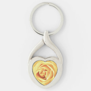 Gul ros tryck twisted heart silverfärgad nyckelring