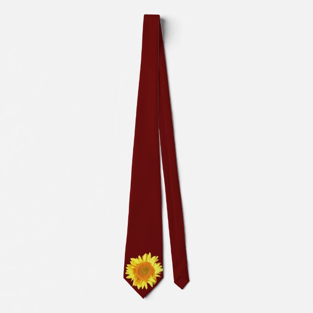 Gul solros som visas på rödbrunt slips (Framsida)