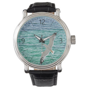 Gul som flyger över havet armbandsur