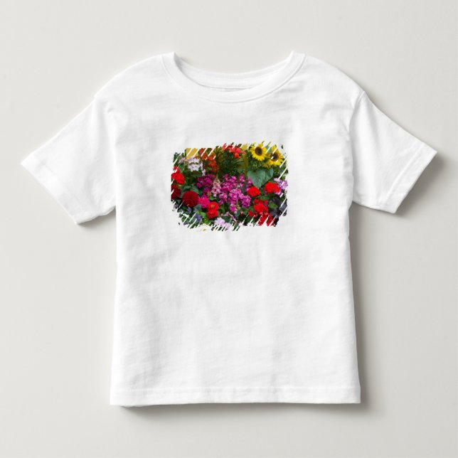 Gul staket med blomsterträdgård i tee shirt (Framsida)