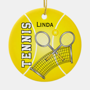 Gul tennisboll och förtjänar julgransprydnad keramik