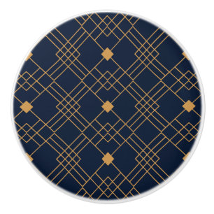 Guld art deco mönster mot mörk blått bakgrund knopp