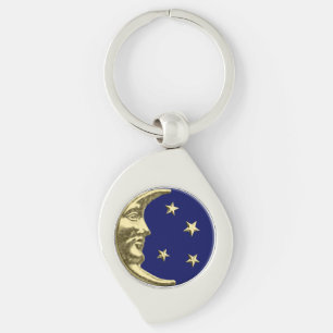 Guld- art décomåne och stjärnor - som är marin swirl silverfärgad nyckelring