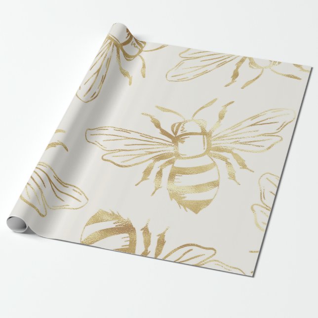 Guld Bee Design, på Cream-bakgrunden. Presentpapper (Utrullad)