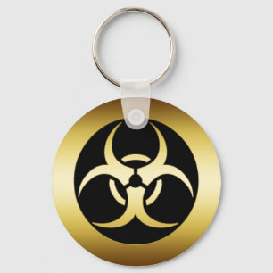 GULD- BIO--HARZARDSYMBOL NYCKELRING