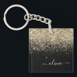 Guld Black Glitter Skriptskript, Monogram Girly Na<br><div class="desc">Svarta och Guld Faux Foil Gnistra Glitter Skriptmonogram Namn Keychain. Det gör perfekten söt 16-årsjubileum,  bröllop,  möhippa,  årsdag,  babydusch eller bachelorette-fest för någon som glam lyxen och chic stilar i kärlek.</div>