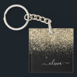 Guld Black Glitter Skriptskript, Monogram Girly Na<br><div class="desc">Svarta och Guld Faux Foil Gnistra Glitter Skriptmonogram Namn Keychain. Det gör perfekten söt 16-årsjubileum,  bröllop,  möhippa,  årsdag,  babydusch eller bachelorette-fest för någon som glam lyxen och chic stilar i kärlek.</div>