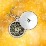Guld & Black - MAMMA - WOW | STERLING SILVER Berlockhalsband<br><div class="desc">Stunningen svart och guld mönster på ett Sterling silver Locket Necklace,  monogrammat med MAMMA och WOW som en återspegling av MAMMA för Mors dag.</div>