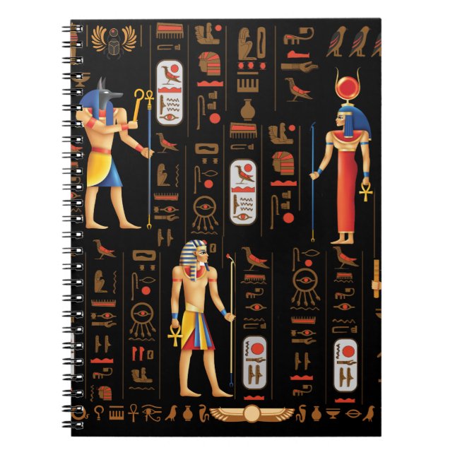 Guld-egyptiska hieroglyfer och gudom på svart anteckningsbok (Framsidan)
