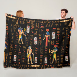 Guld-egyptiska hieroglyfer och gudom på svart fleecefilt