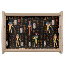 Guld-egyptiska hieroglyfer och gudom på svart
