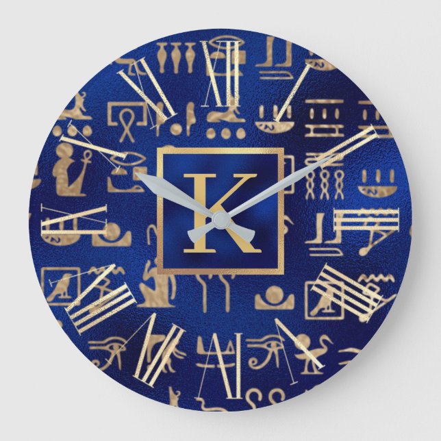 Guld egyptiska hieroglyfer på blå initial stor klocka (Framsida)