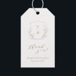 Guld, enkelt botaniskt vapensköld monogram bröllop presentetikett<br><div class="desc">Monogrammad initialer inramad av elegantens vapensköld och handillustrerad botaniskt löv,  elegant och klassiskt typsnitt i guld och vitt,  enkelt och lyxigt. Underbart tack för att du föredrar klistermärken för det moderna klassiska bröllop,  det enkla formella bröllop,  elegant botaniska trädgårdsbröllop. Visa alla matchande delar i samlingen.</div>