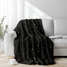 Guld faux glitter och gnistor på svart fleecefilt