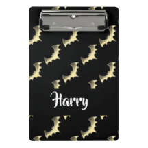 Guld fladdermöss på svart