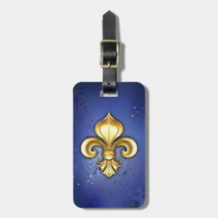 Guld Fleur de Lis på Blå Bagagebricka