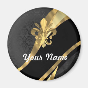 Guld- fleur de lys på svart magnet