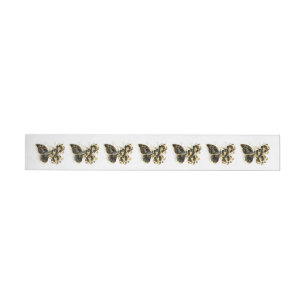 Guld Flower Butterfly med Black Orchid Etikettband
