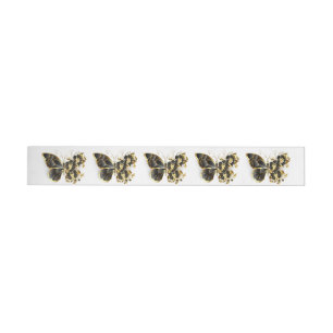 Guld Flower Butterfly med Black Orchid Etikettband