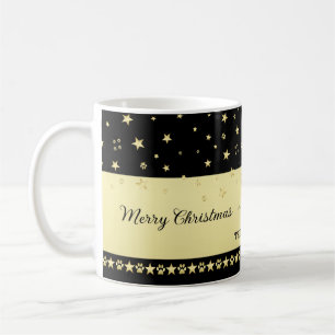 Guld glänsande julstjärnor, tassar på guld och sva kaffemugg