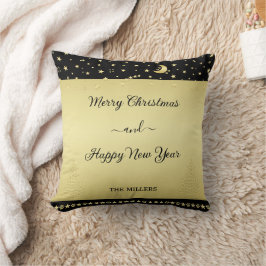 Guld glänsande julstjärnor, tassar på guld och sva kudde