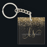 Guld Glitter Glam Monogram Namn<br><div class="desc">Glam Guld Elegant Monogram Namn-nyckelkedjan i Glitter anpassar enkelt trendigets nyckelkedjedesign för chic med elegant guld mousserande glitter på svart bakgrund. Designen har ditt handskrivna skriptmonogram med söt-snurrar och namn.</div>
