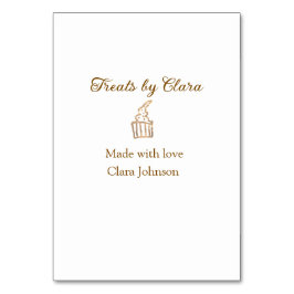 Guld gnistra behandlar bakverk som tillverkats med bordsnummer