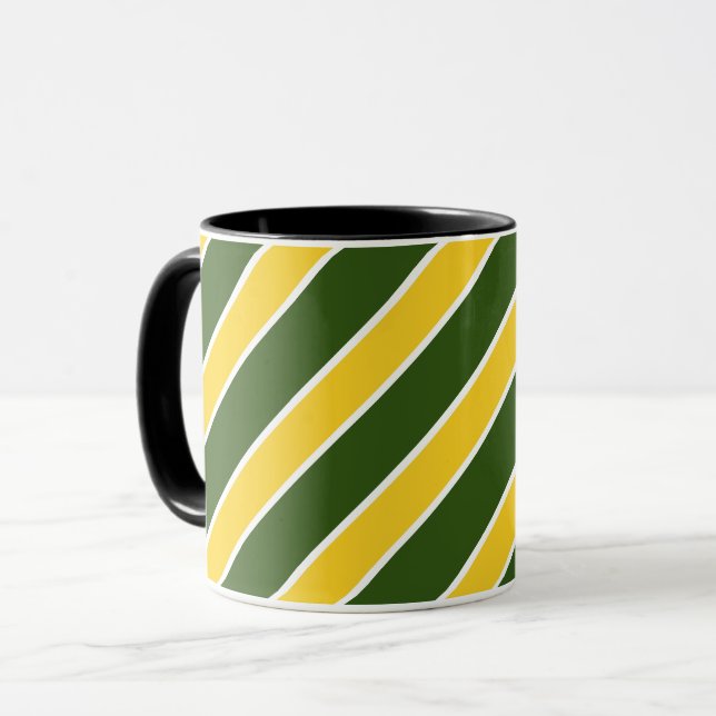 Guld/grönt, vit sätter band, randar, metat som mugg (Framsida vänster)