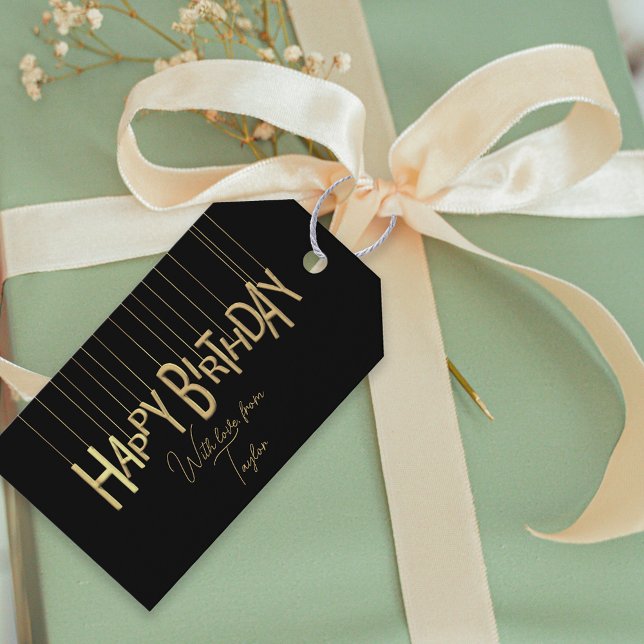 Guld Hanging Lettering på Svarta Grattis på födels Presentetikett (Skapare uppladdad)