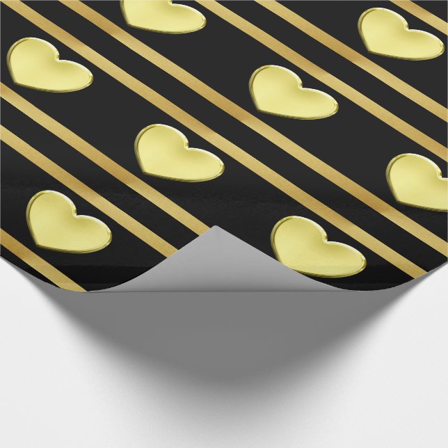 Guld- hjärtor på den svart och guld- gåvan som presentpapper (Hörn)