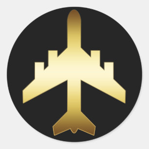 GULD- JETFLYGPLAN RUNT KLISTERMÄRKE