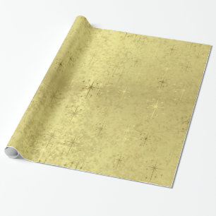 Guld- julstjärnor omkullkastar på papper presentpapper