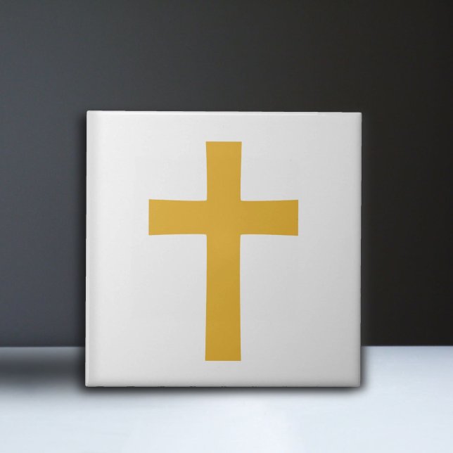 Guld Kor vid White Kakelplatta (Gold Cross on White Ceramic Tile)
