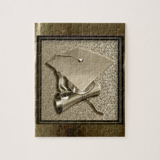 Guld- lock och diplom på guld pussel