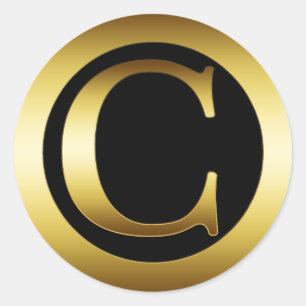 GULD- MONOGRAMBREV C RUNT KLISTERMÄRKE