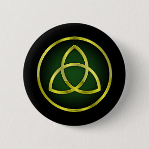 guld och grönt triquetra knapp