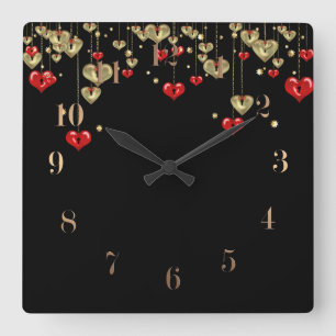 Guld och röda hjärtan mot svart bakgrund fyrkantig klocka